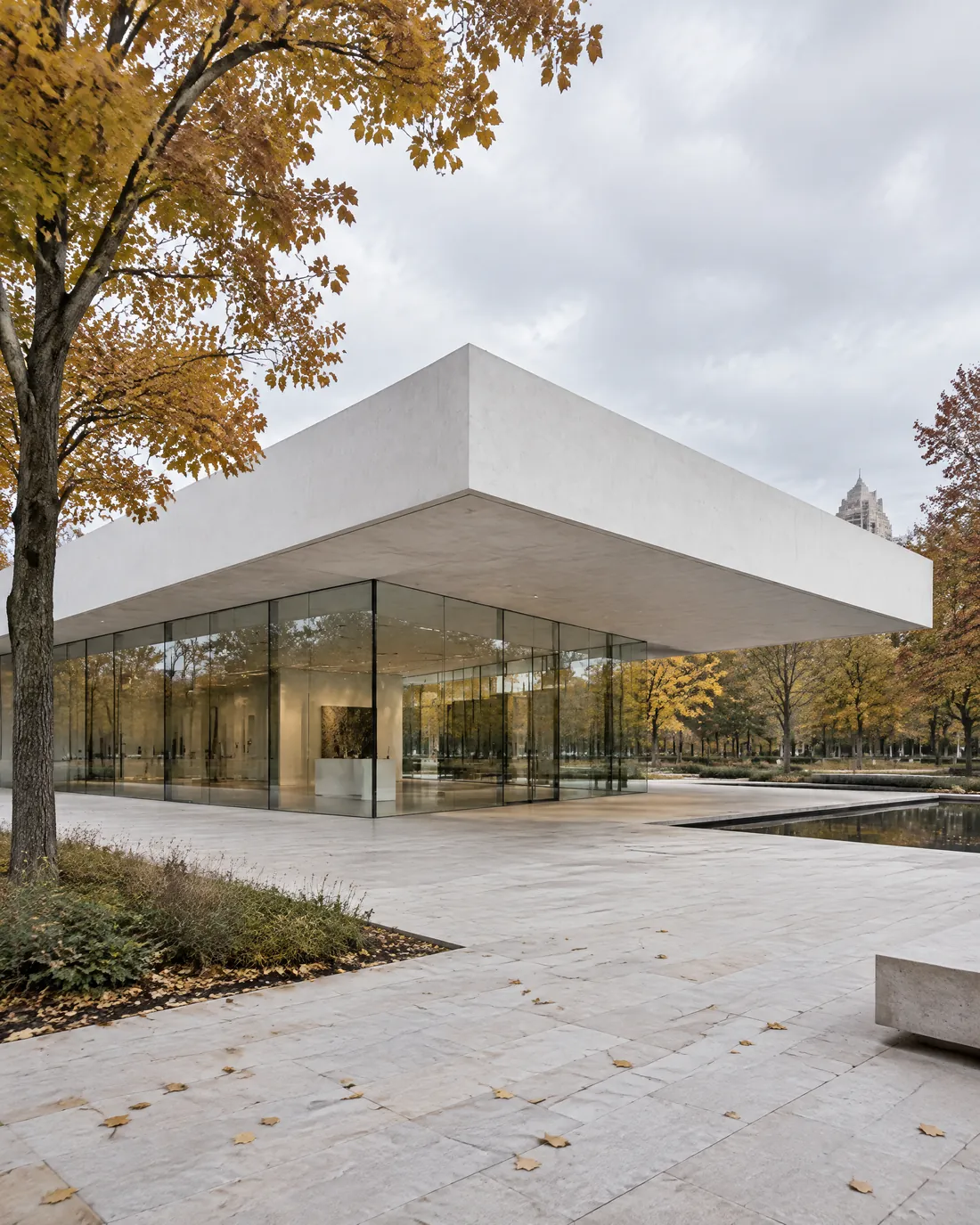 Pavillon culturel à toiture blanche flottante dans un parc